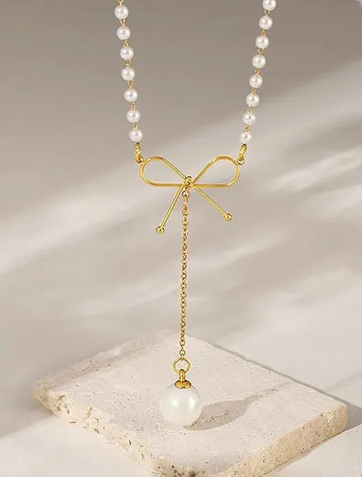 Graceful Bow Necklace with Faux Pearl Accent