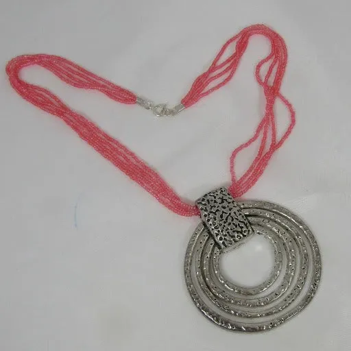 Melon Seed Bead Necklace with Hammered Antique Silver Pendant