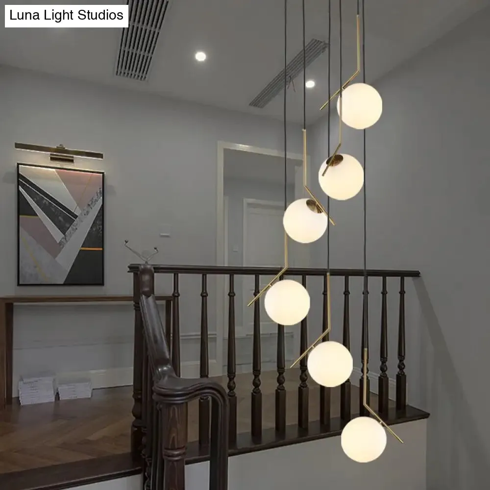 Opal Glass Multi-Light Pendant in Gold for Stylish Staircase Lighting