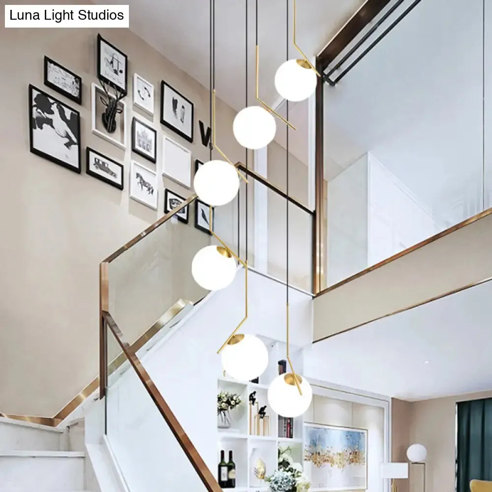 Opal Glass Multi-Light Pendant in Gold for Stylish Staircase Lighting