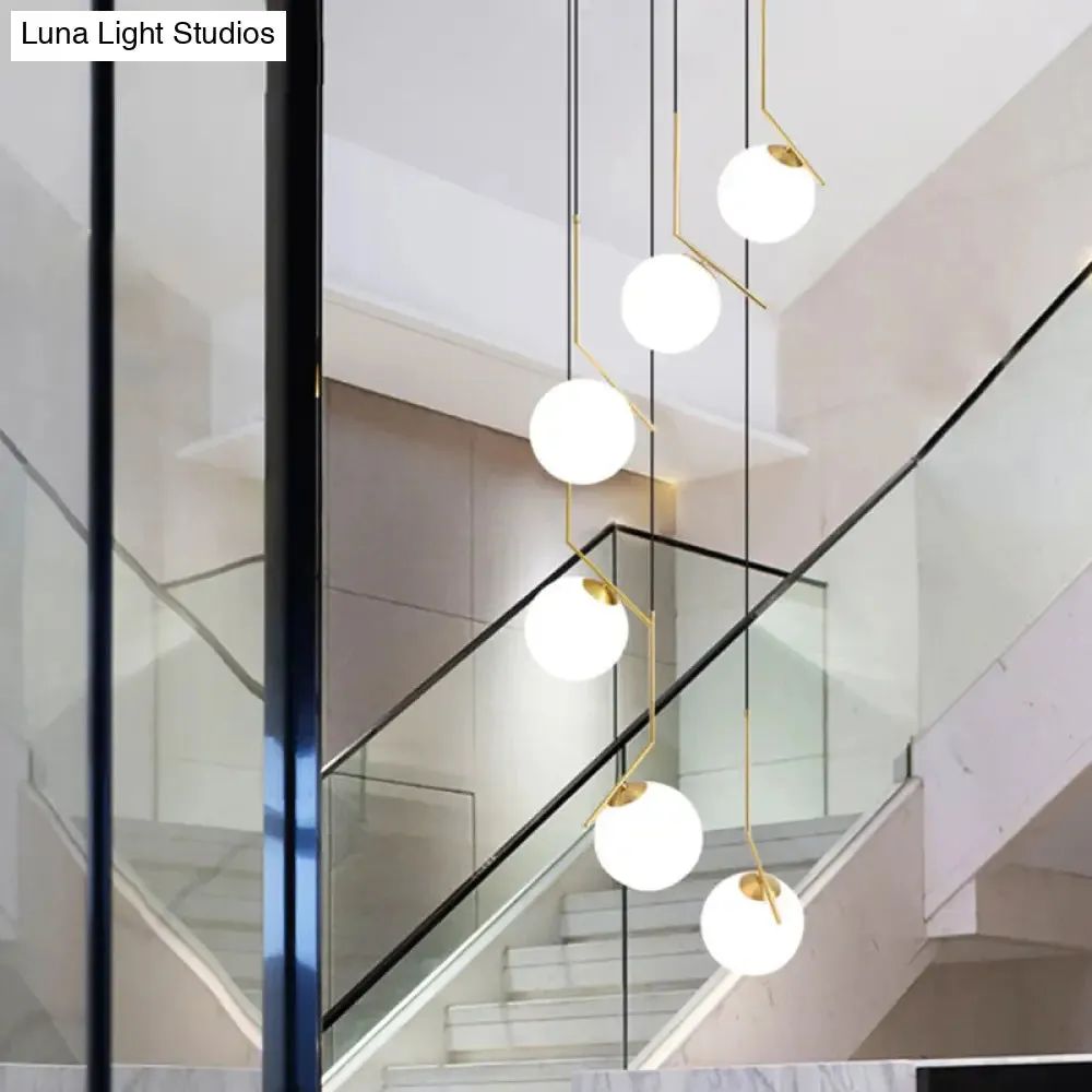 Opal Glass Multi-Light Pendant in Gold for Stylish Staircase Lighting