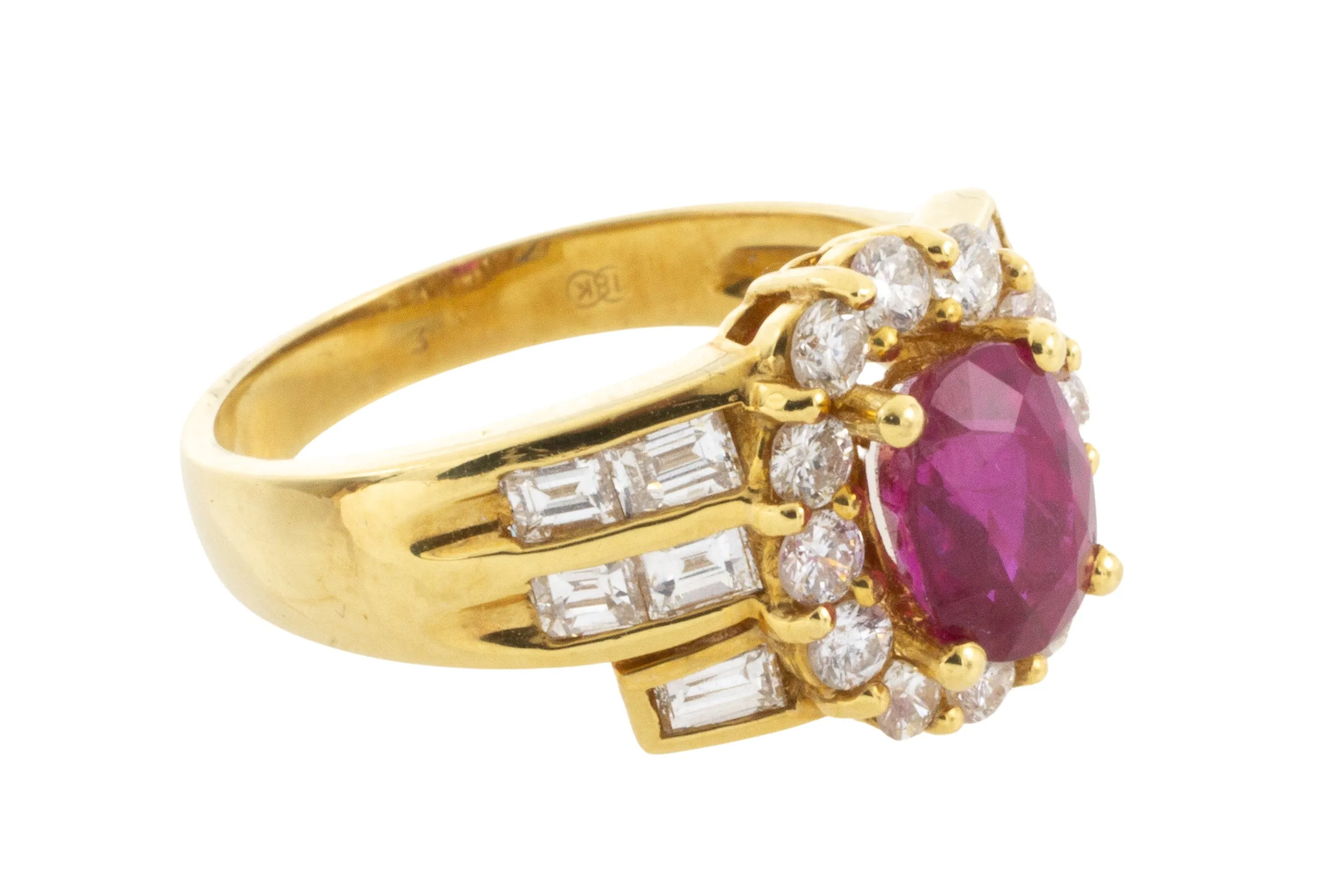 Ruby ring with baguette and brilliant cut diamonds