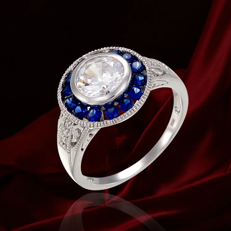 Vintage Inspired Bezel Setting Ring with Blue Sapphire Halo